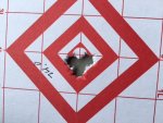 300 win mag 210 three shot group.jpg