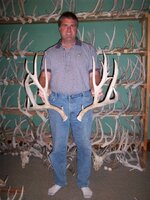 Art holding antlers.JPG